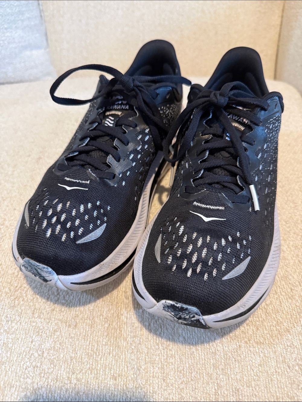 Hoka women’s Black and White Running Shoes